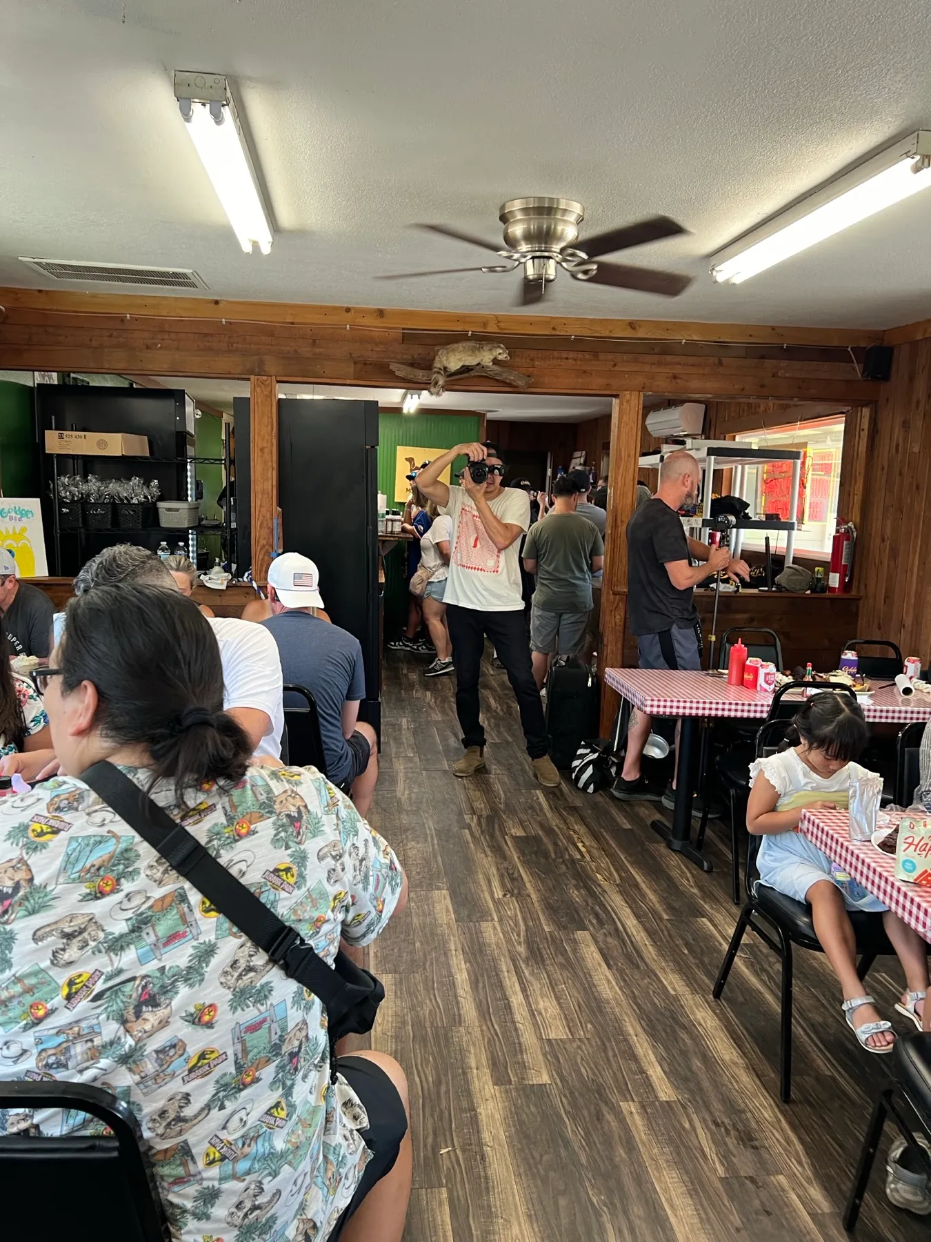 The dining room at Goldee's Barbecue in Fort Worth, with communal tables and counter service