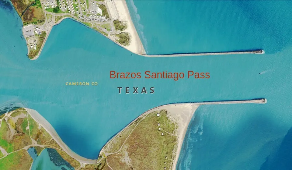 Aerial view of Brazos Santiago Pass with Isla Blanca Park on the South Padre Island shore