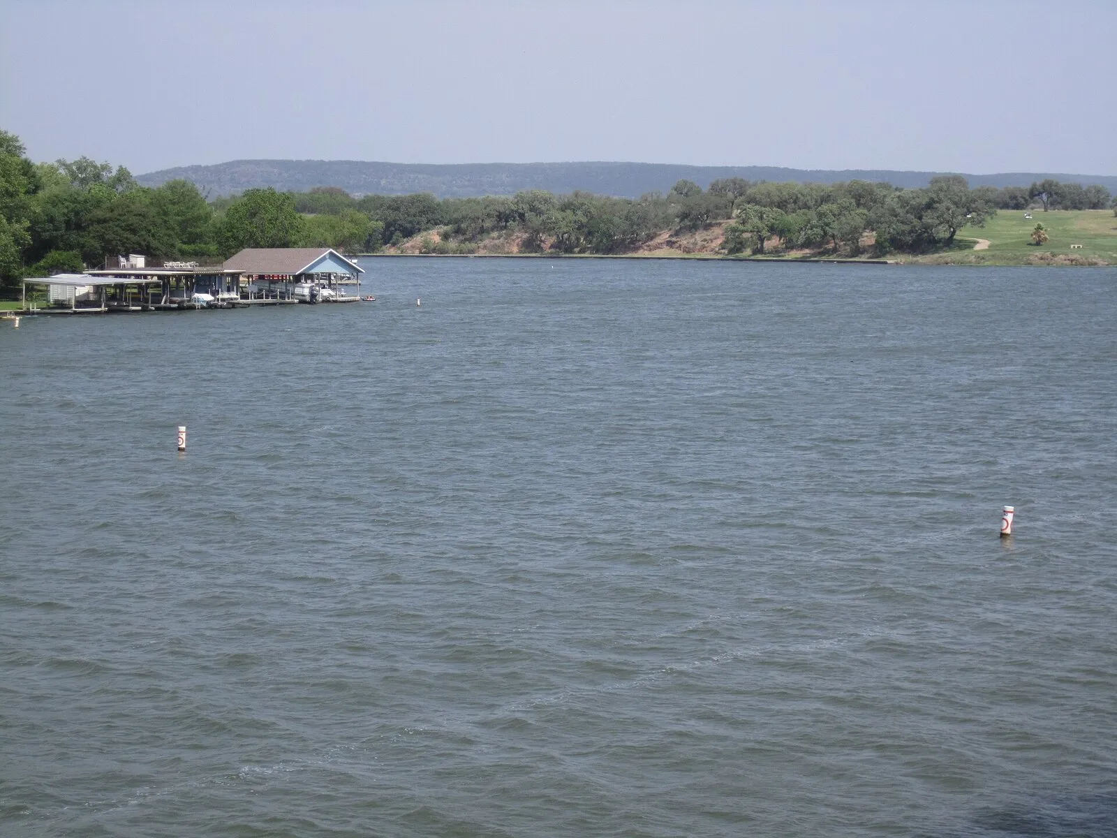 Calm water and homes along Lake LBJ in Kingsland