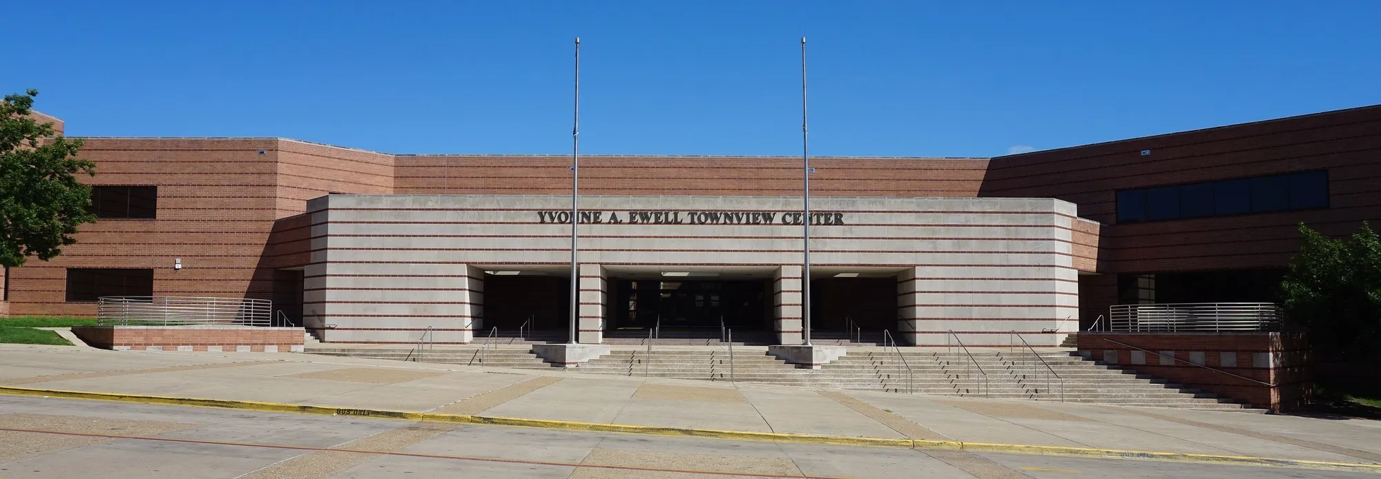 The brick facade and front steps of the Yvonne A. Ewell Townview Center in Dallas