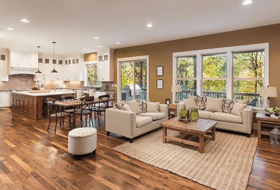 A bright open-plan living room and kitchen used to illustrate MaidLuxe residential cleaning