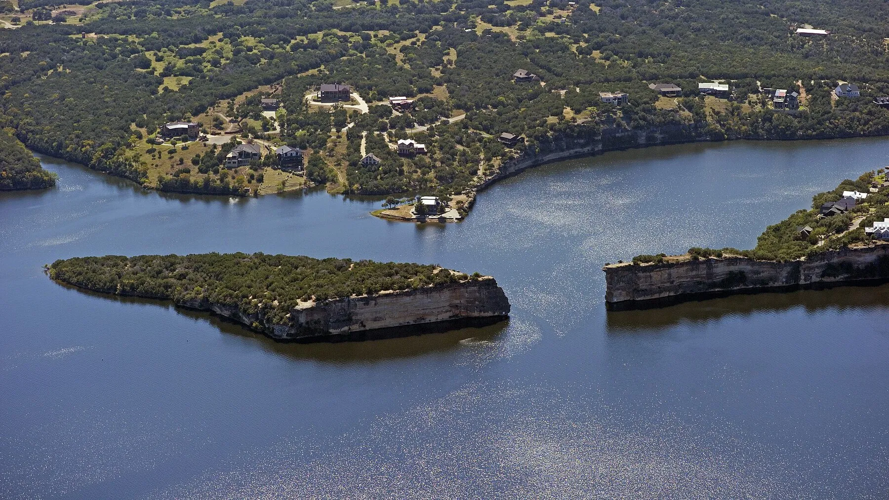 Aerial view of the Hell's Gate cliffs and blue water at Possum Kingdom Lake
