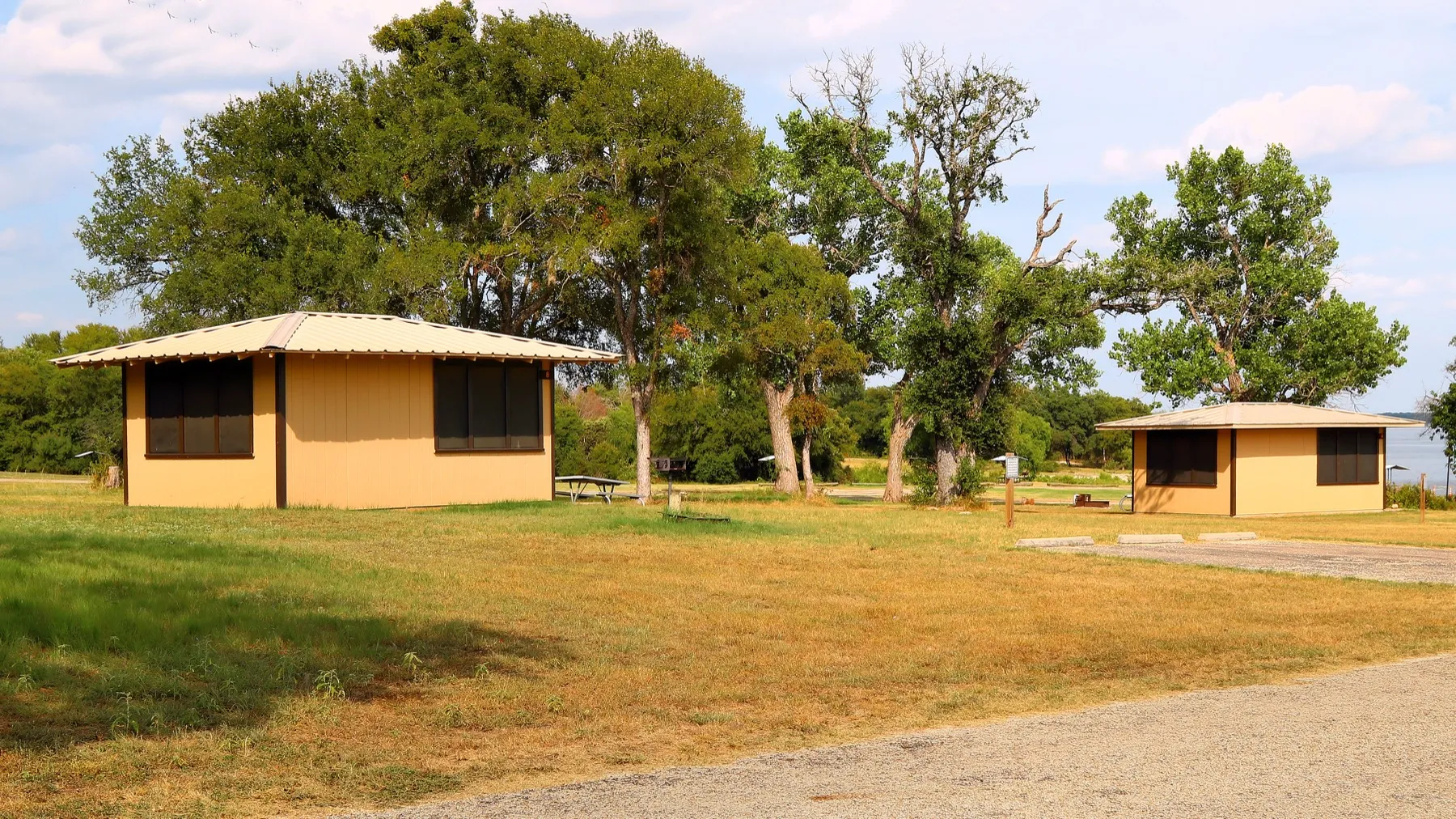 Screened shelters overlooking the water at Lake Whitney State Park in Hill County