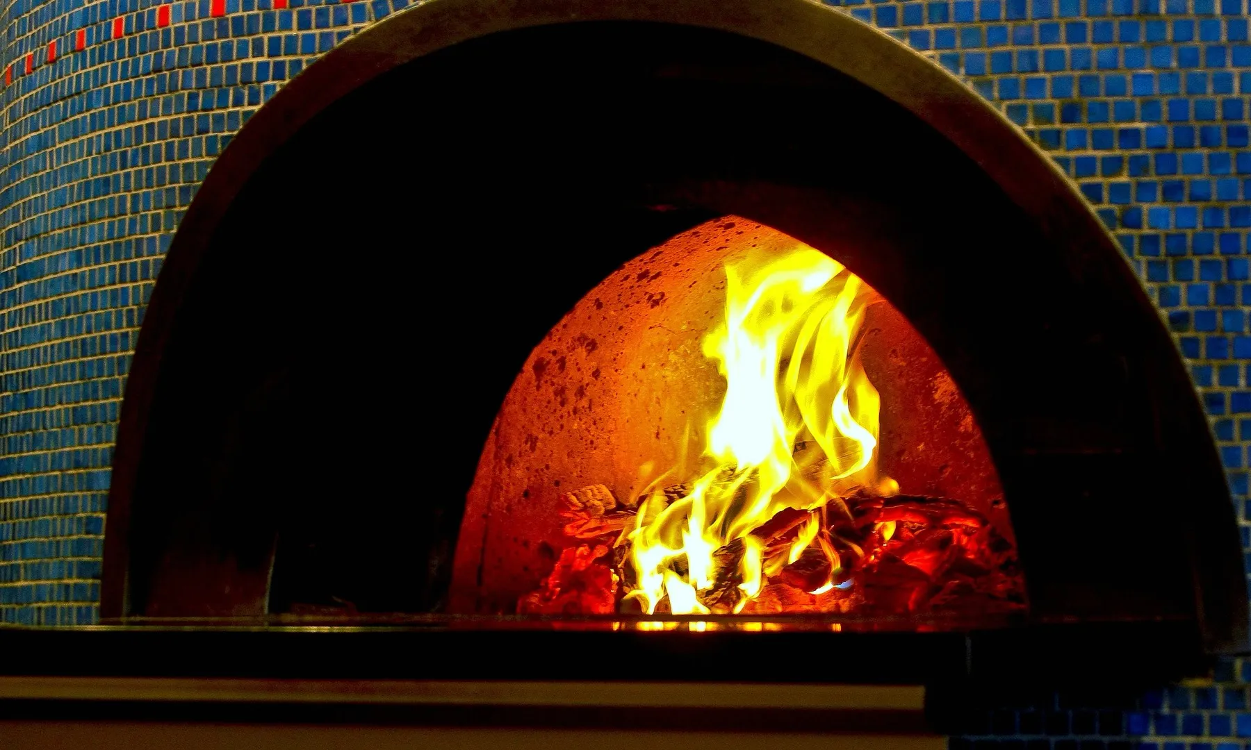 A blistered Neapolitan pizza fresh from a wood-fired oven