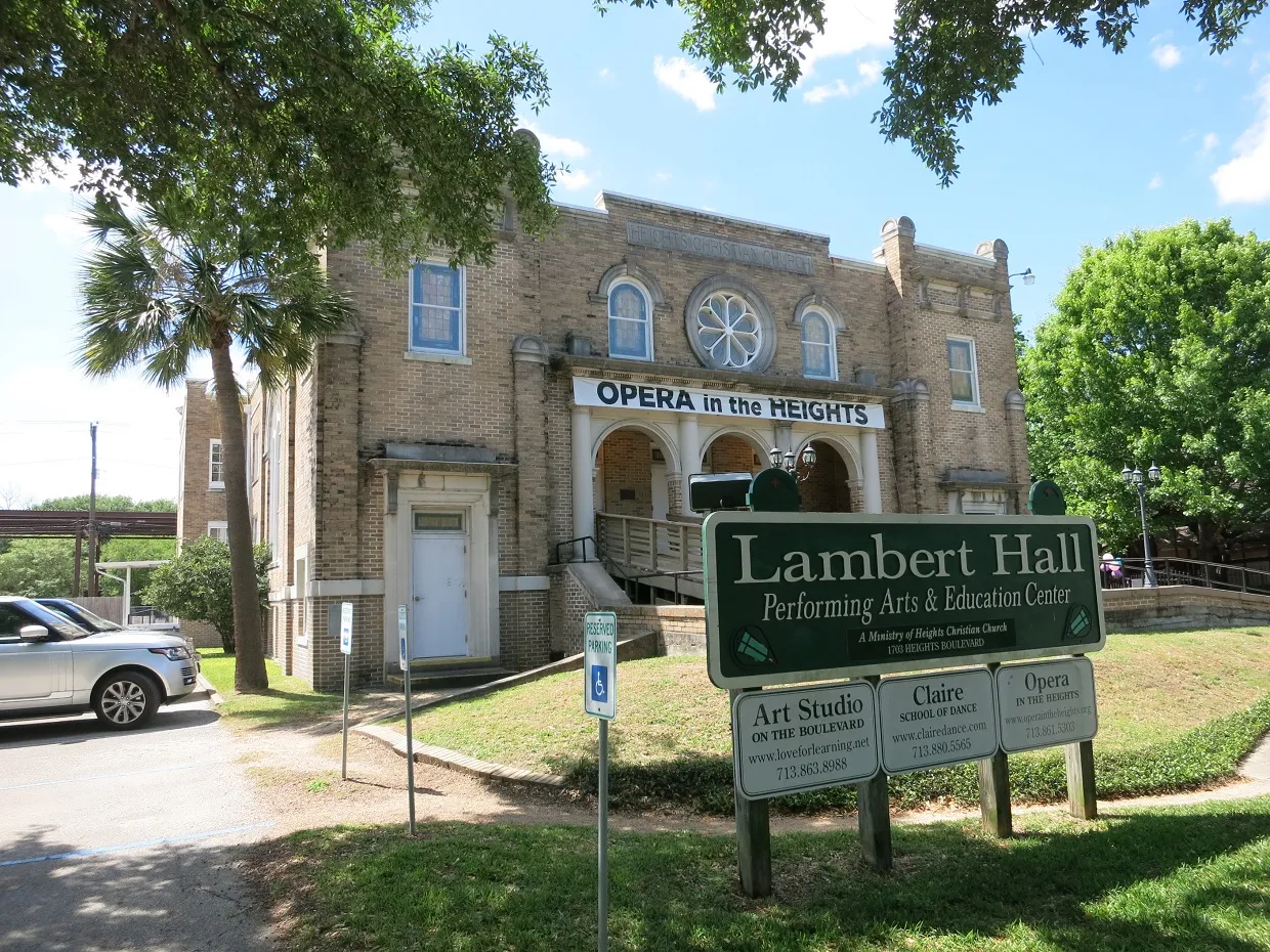 The brick facade of Lambert Hall in the Houston Heights