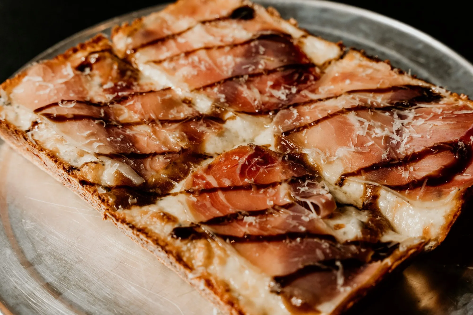 Via 313's rectangular Cadillac pizza with prosciutto, fig preserves, cheese and balsamic glaze