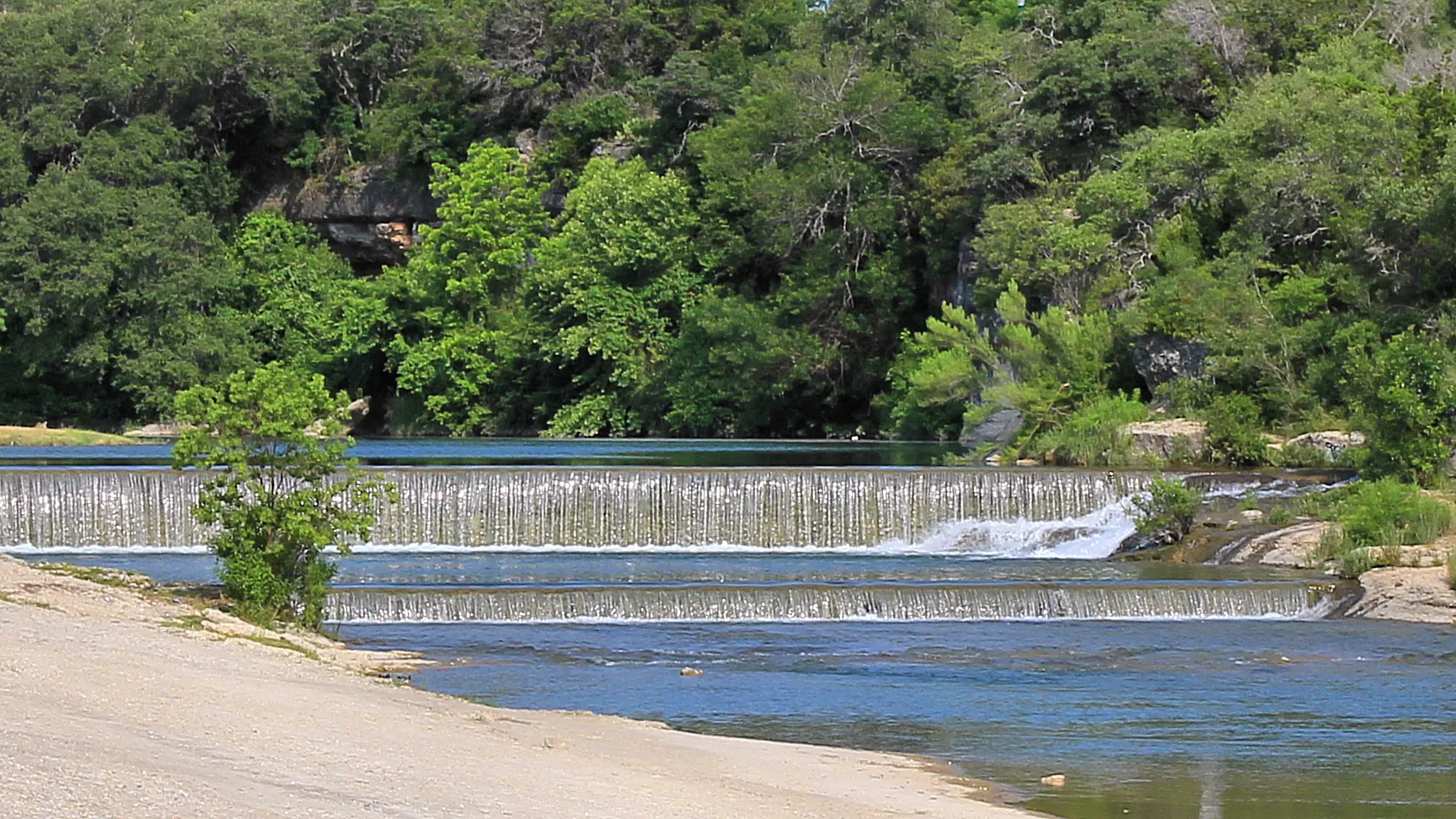 The waterfall and swimming hole at Blue Hole Park on the San Gabriel River in Georgetown
