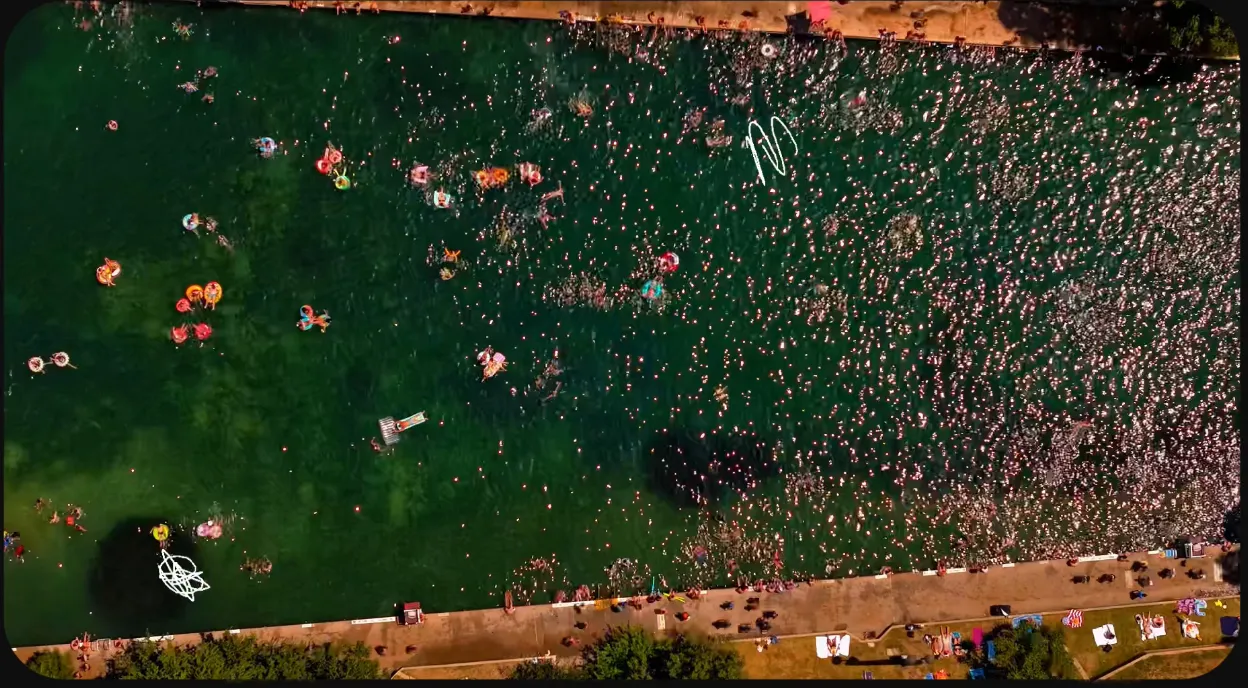 Aerial view of the long spring-fed Barton Springs Pool in Austin