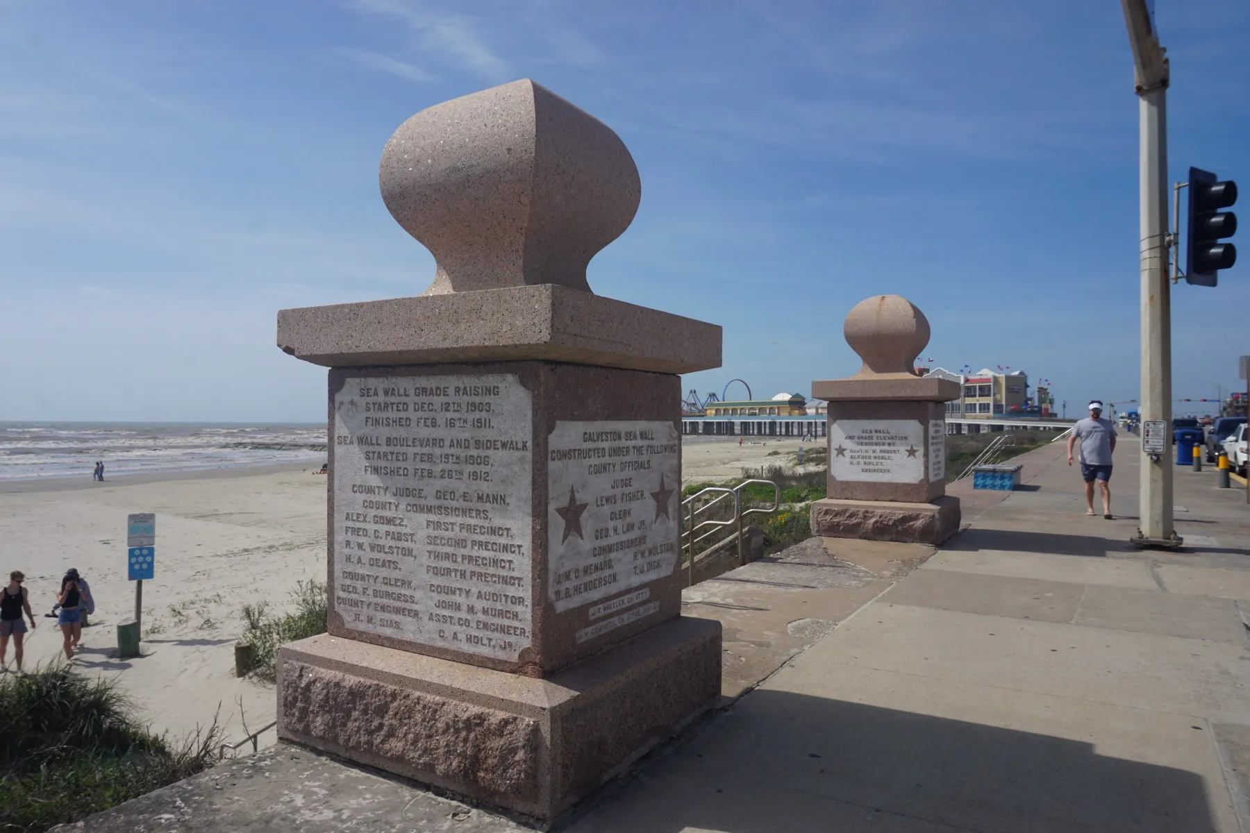 Monuments along the Galveston Seawall on the Gulf shore