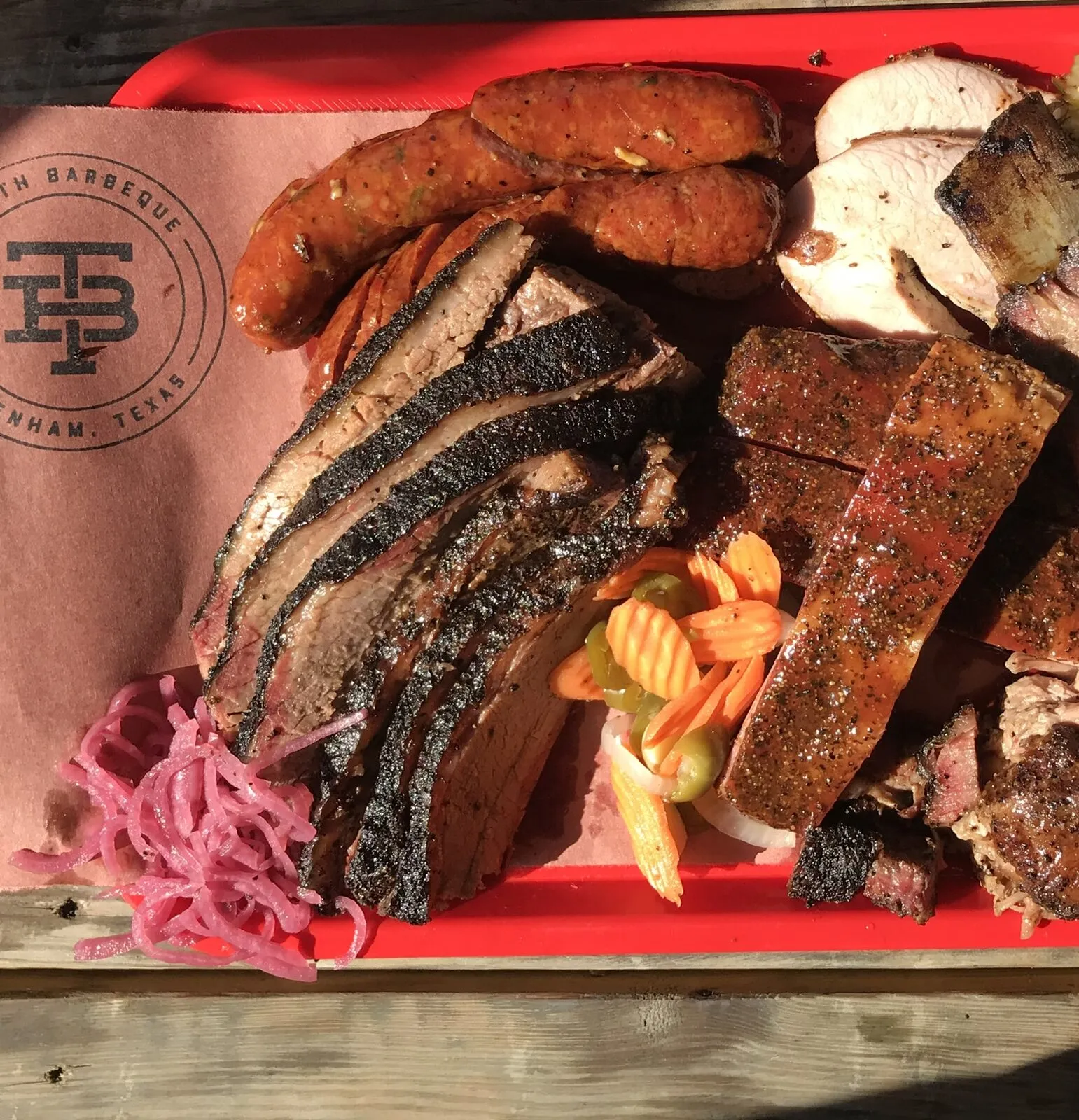A tray of smoked brisket, ribs and sausage at Truth BBQ's original Brenham restaurant