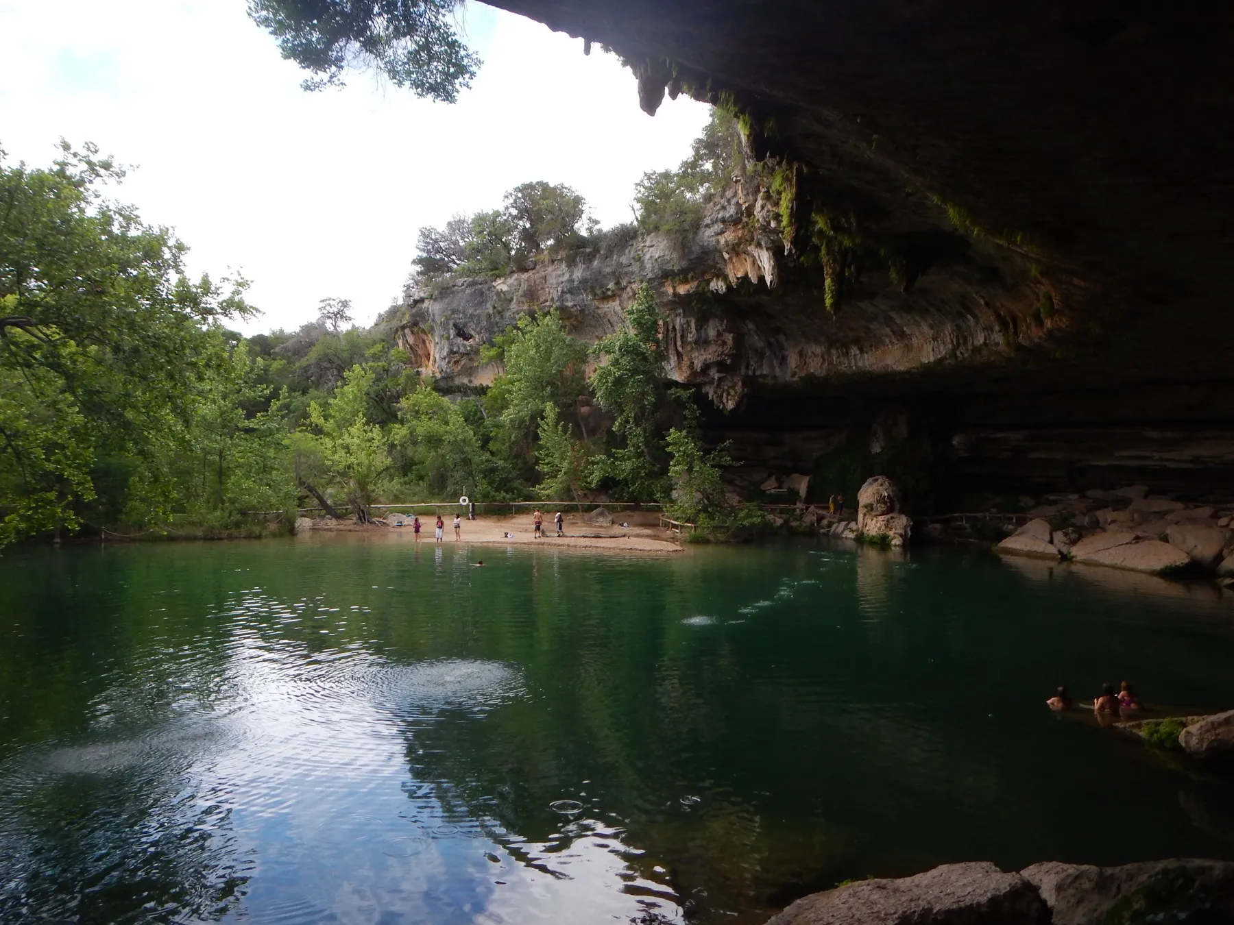 The limestone overhang and waterfall above the pool at Hamilton Pool Preserve