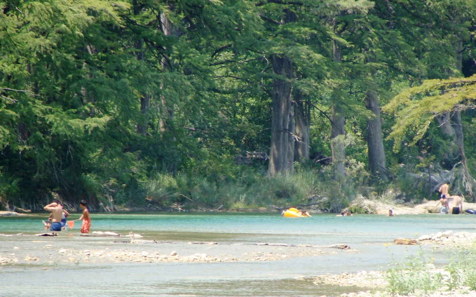 The clear green Frio River running through Garner State Park