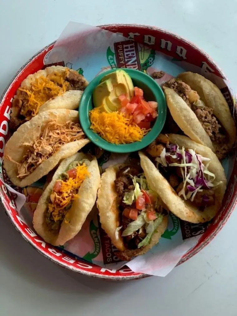 A platter of assorted puffy tacos at Henry's Puffy Tacos