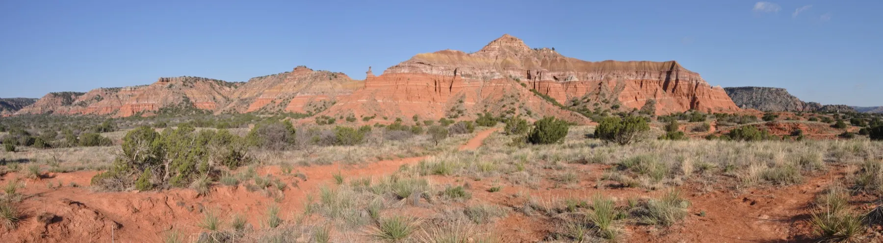 Layered red rock walls and Capitol Peak at Palo Duro Canyon State Park