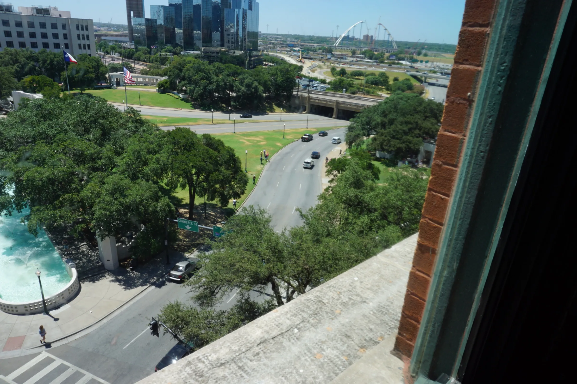 The view over Dealey Plaza and Elm Street from an upper-floor window of The Sixth Floor Museum in Dallas