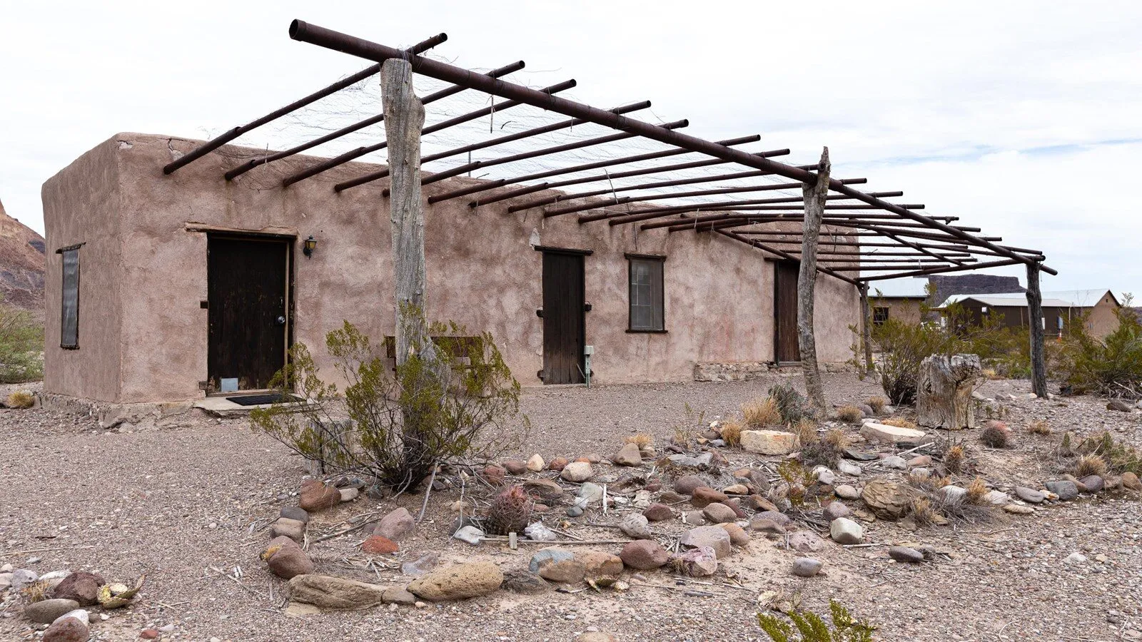 The adobe Garlick House in the Castolon Historic District beneath a desert sky