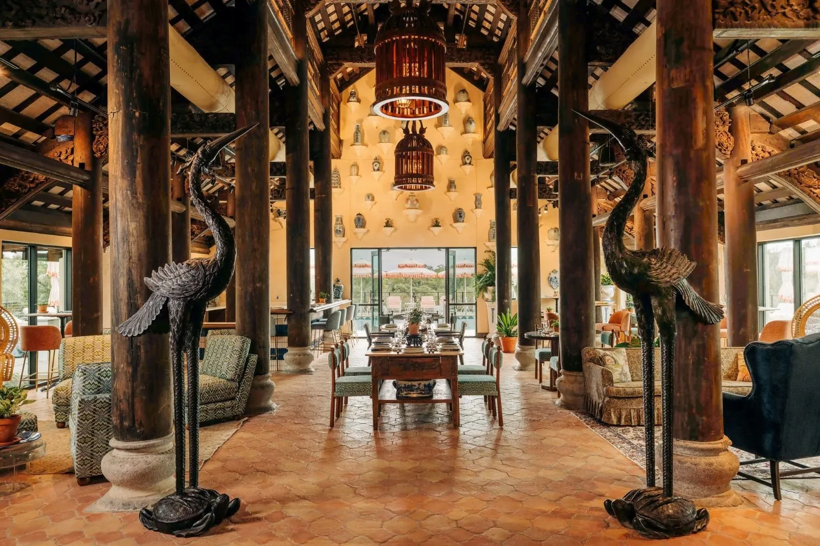 Tall wooden pillars and seating in Tillie's dining room at Camp Lucy