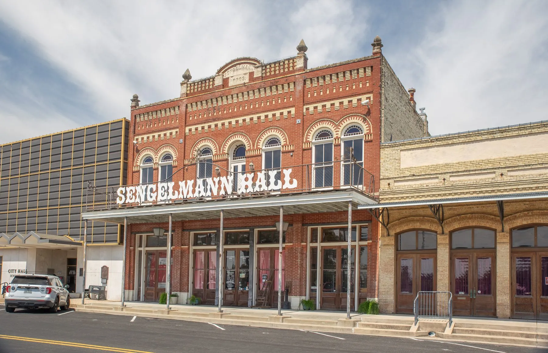 The restored two-storey facade of Sengelmann Hall in Schulenburg, Texas
