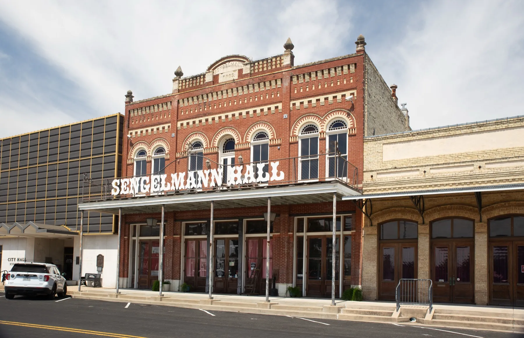 The restored two-storey facade of Sengelmann Hall in Schulenburg, Texas