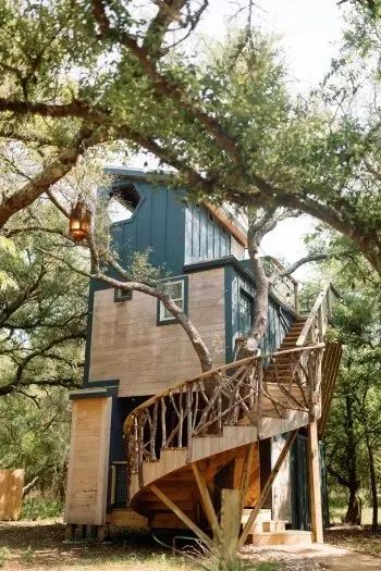 Spiral stairs leading to the Acorn treehouse at HoneyTree Farm