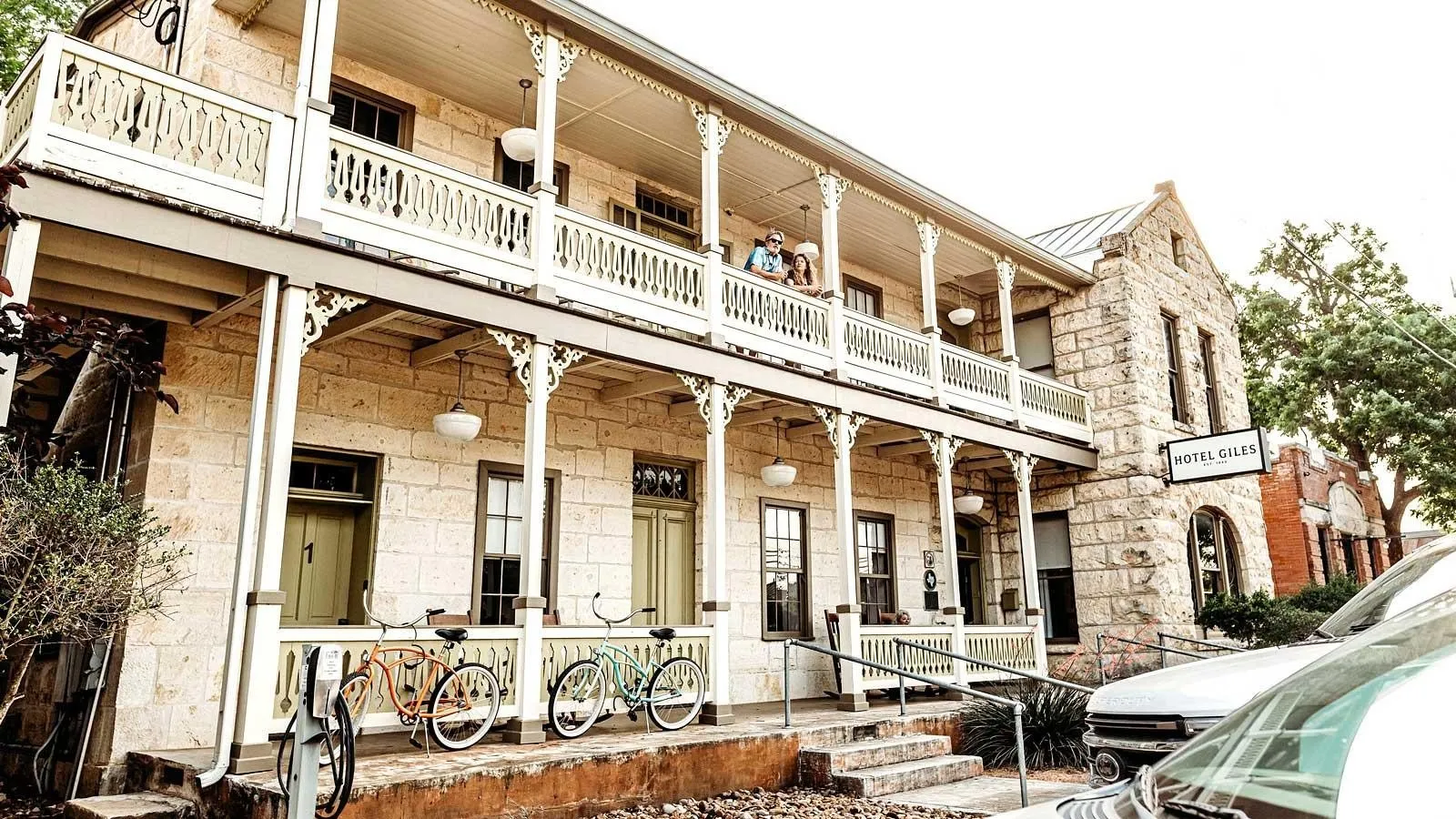 Long upper and lower porches outside Hotel Giles in Comfort