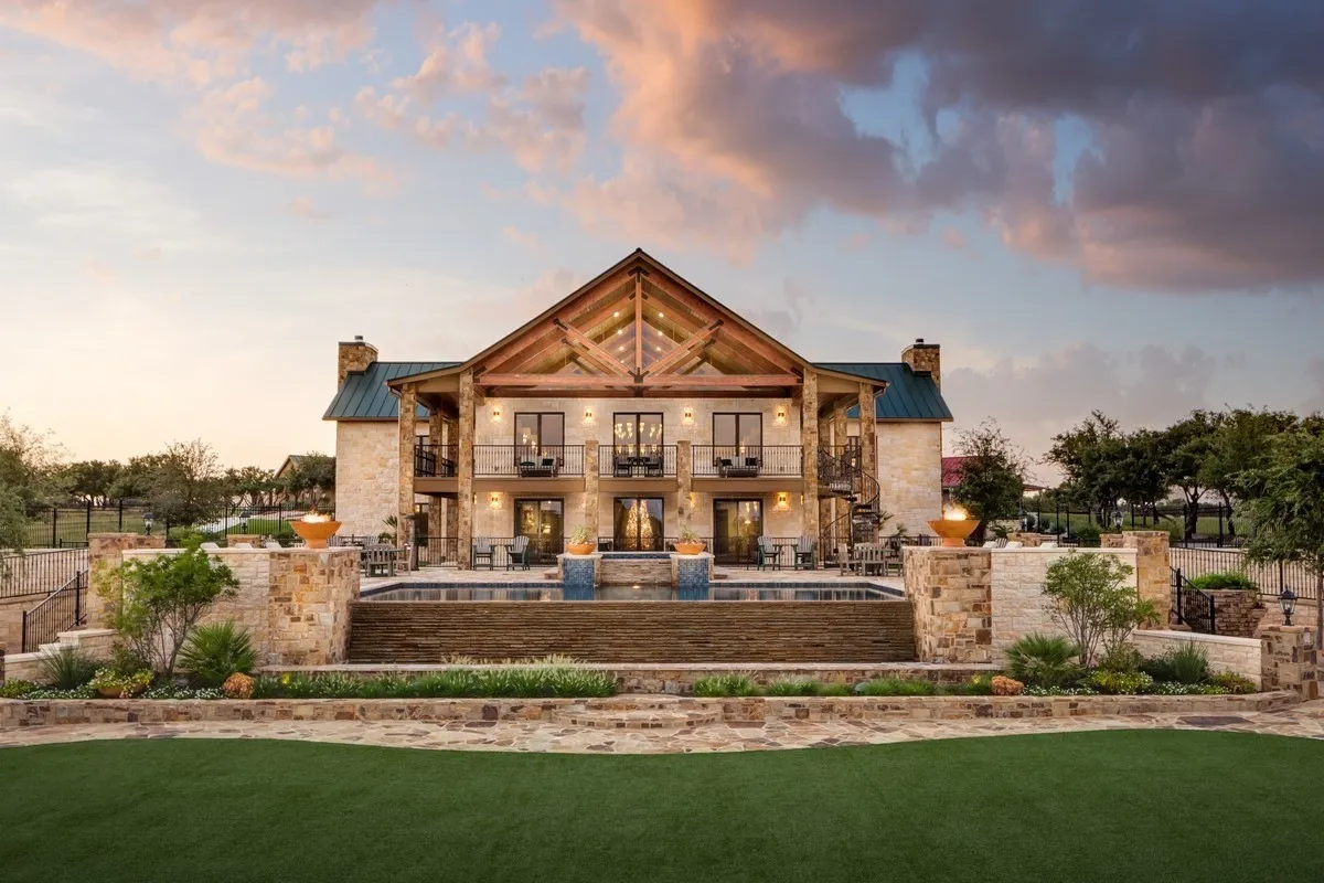 Stone lodge and pool at JL Bar Ranch Resort and Spa