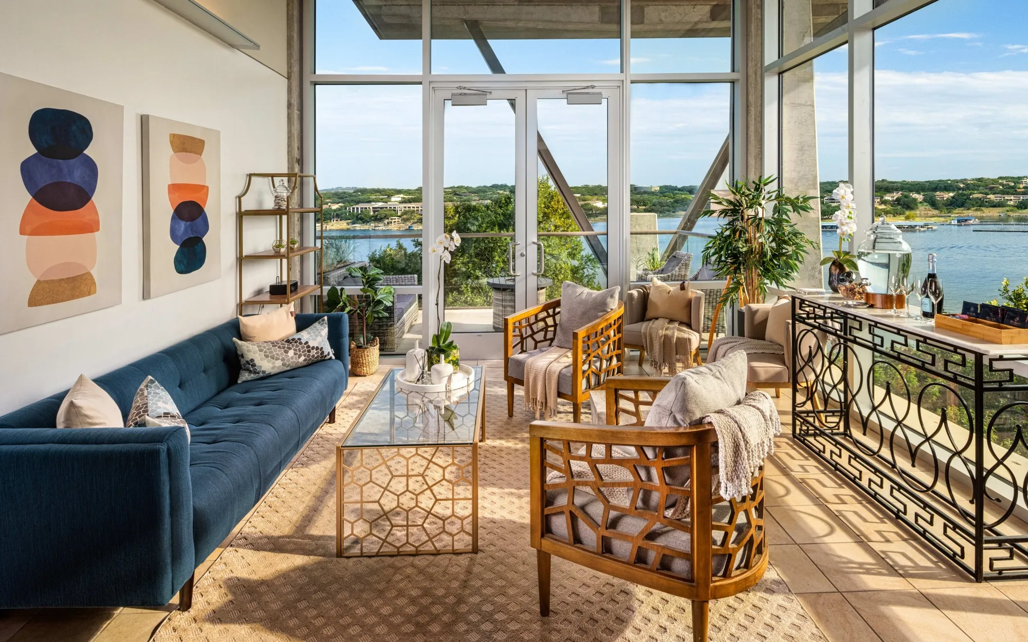 Spa lounge with blue sofa and lake view at Lakeway Resort