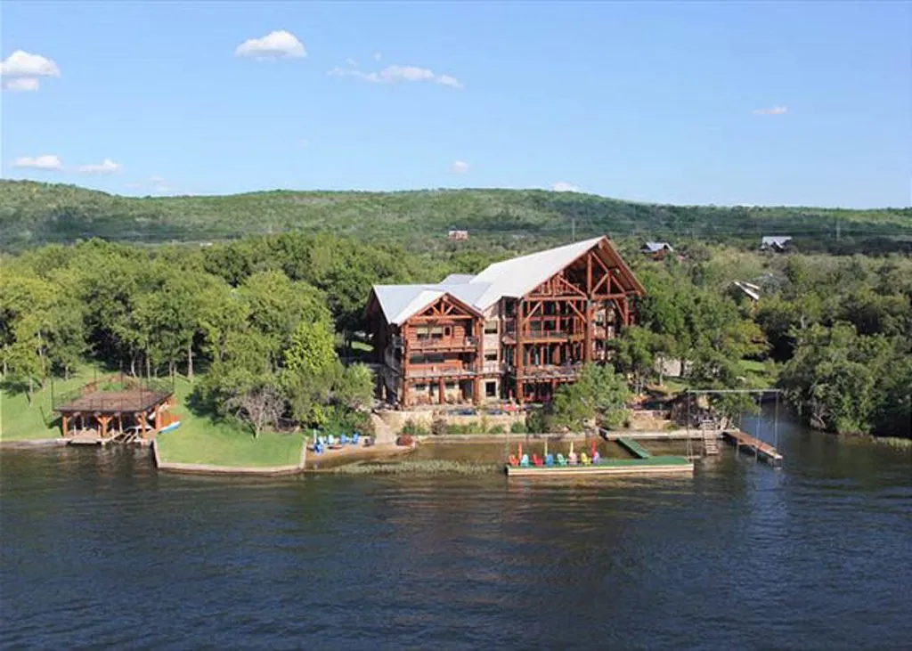 Large log lodge beside Lake LBJ at Log Country Cove