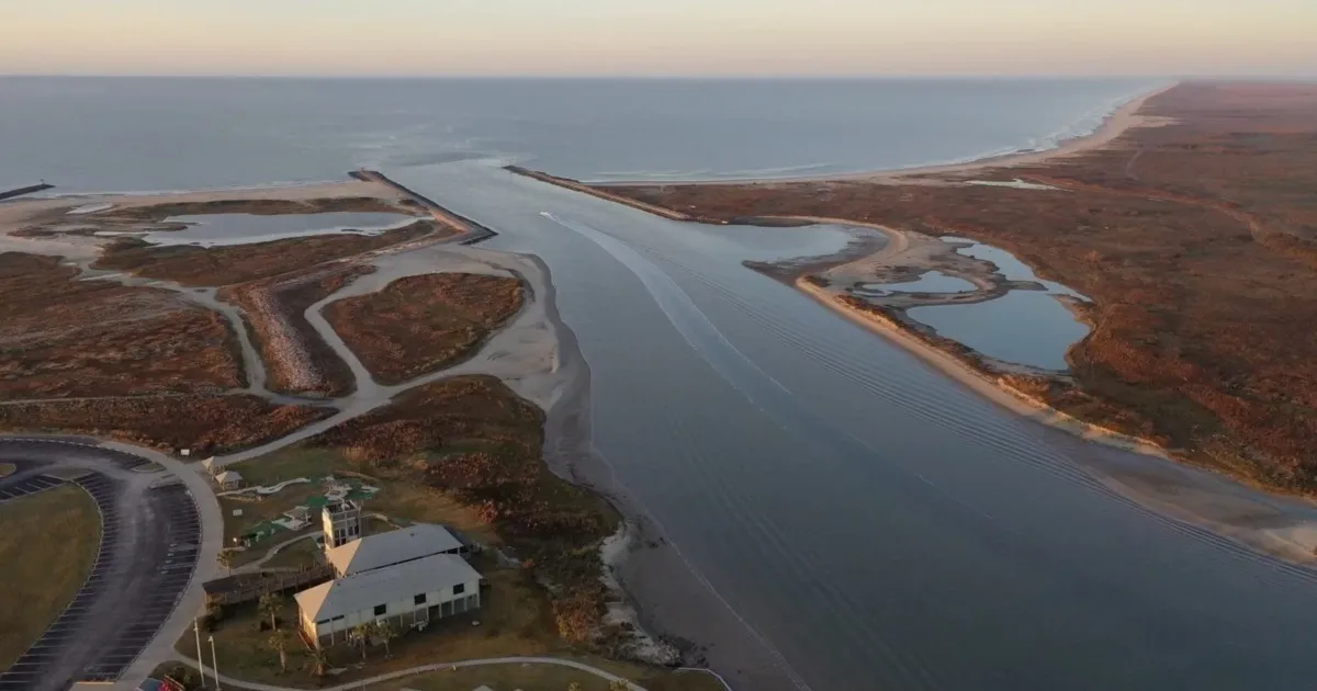 Aerial view of the Colorado River mouth and beach at Matagorda Bay Nature Park