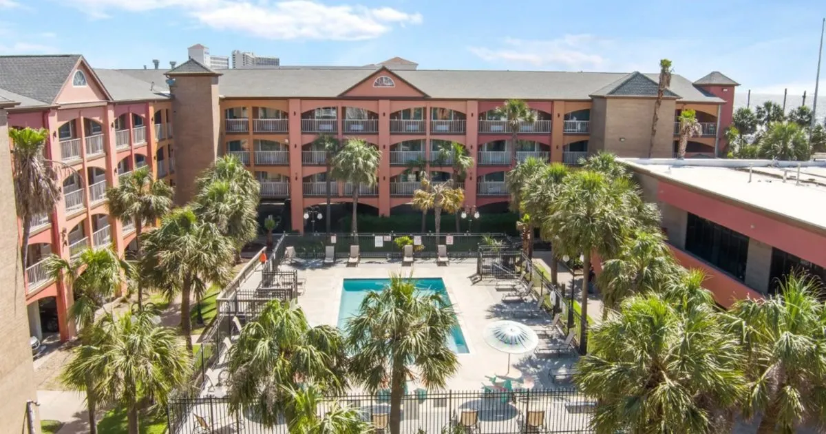 The courtyard and pool at Beachfront Palms Resort