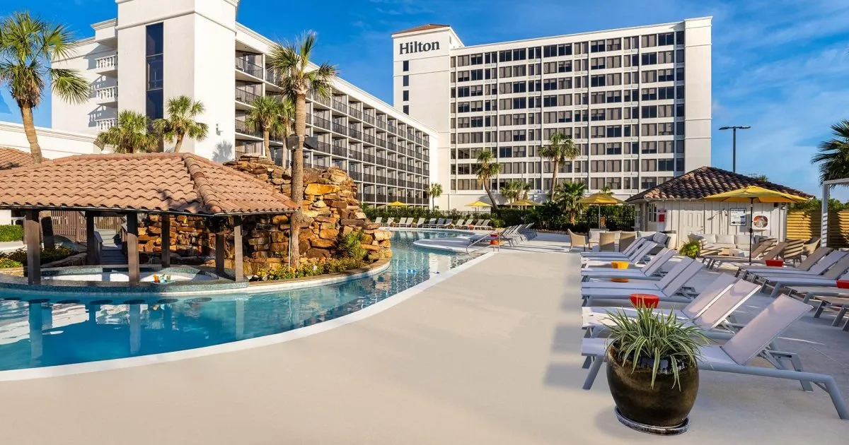 The swimming pool and hotel at Hilton Galveston Island Resort