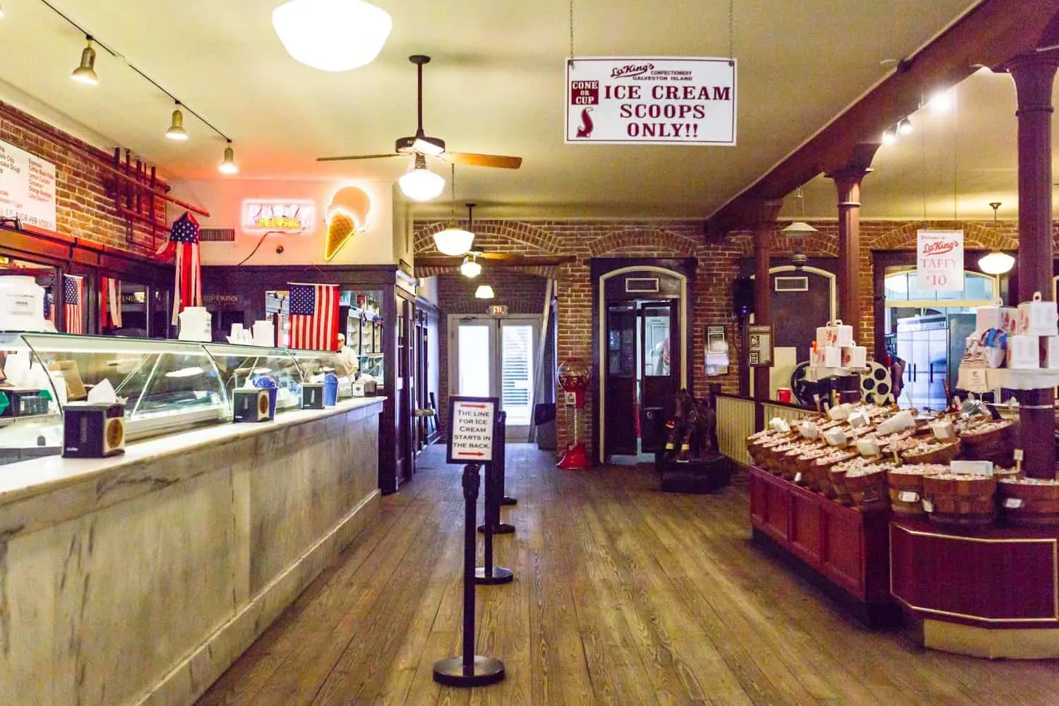 The candy counter and seating inside La King's Confectionery