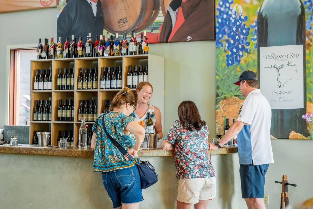 Guests at the tasting bar at William Chris Vineyards