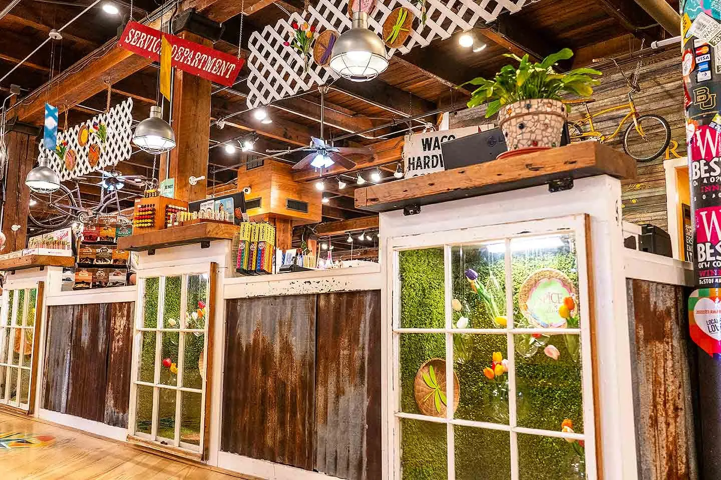 Shop displays and wooden beams inside Spice Village