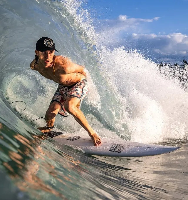 A surfer riding a wave at Waco Surf