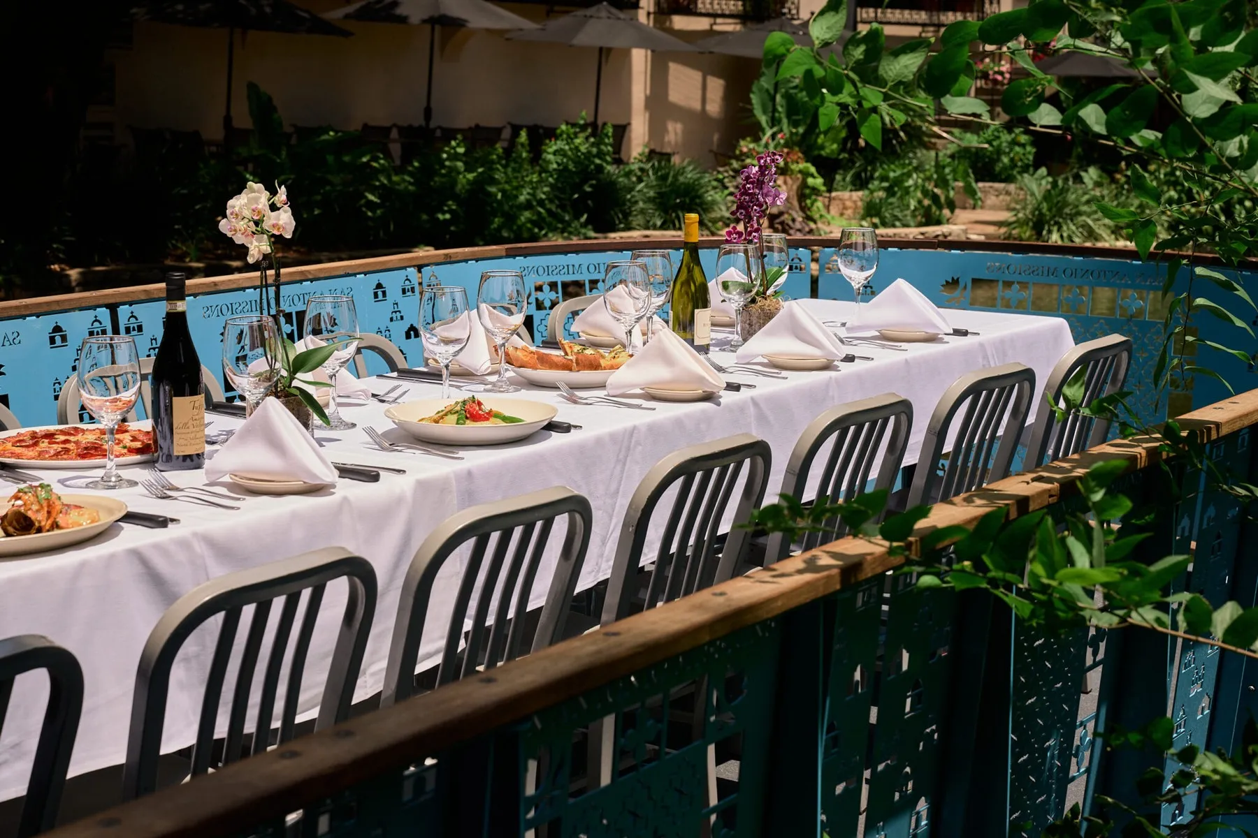 A dining barge set with tables for a Paesanos river cruise
