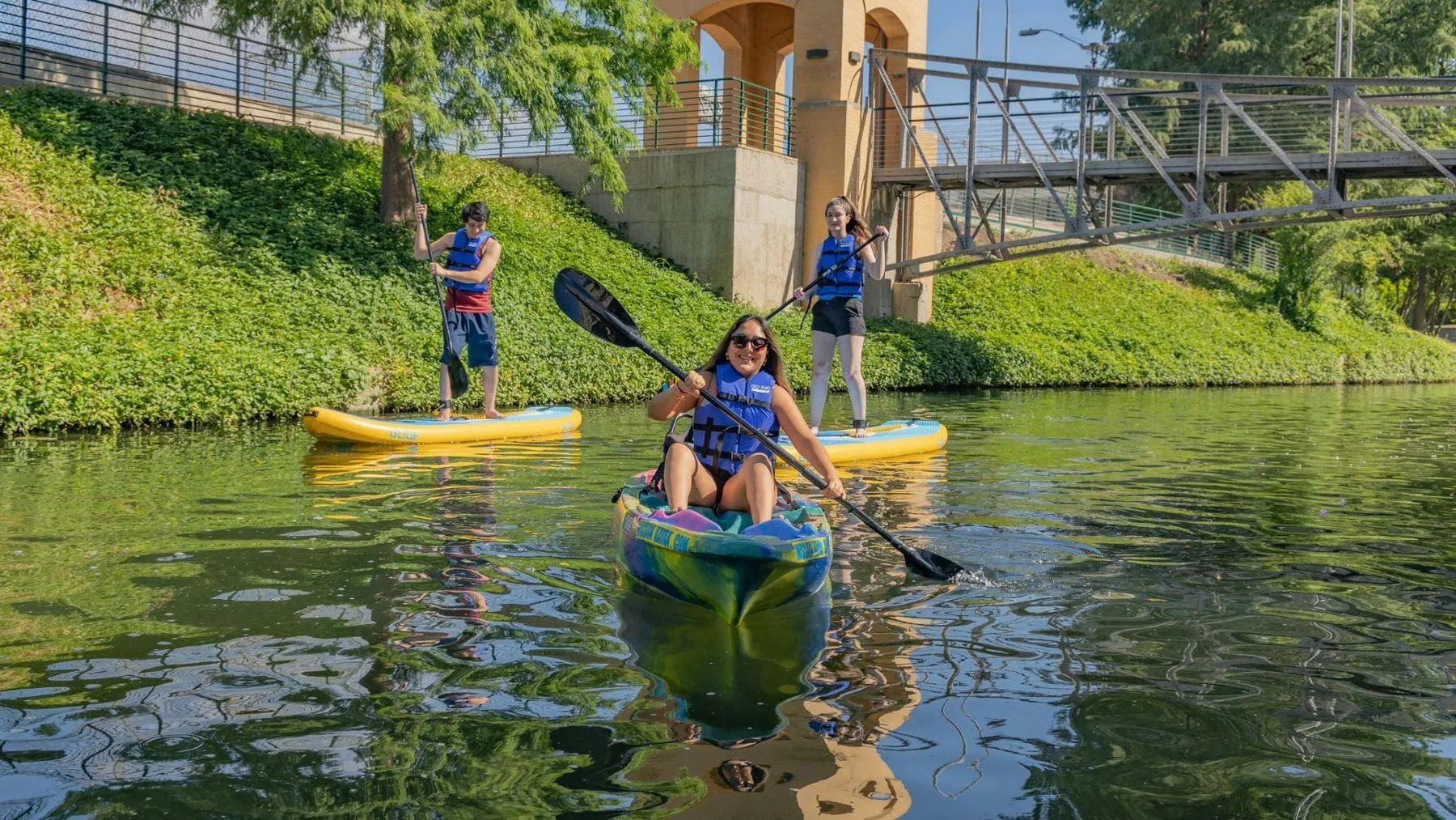 Kayakers paddling on the San Antonio River