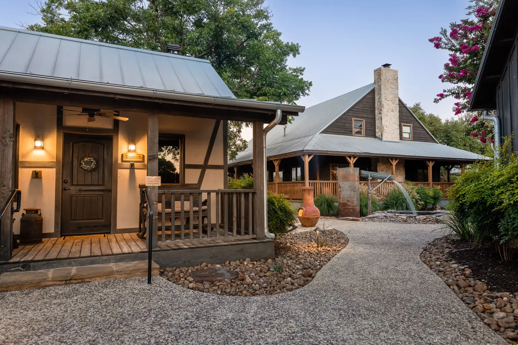 Stone and timber cabins at Cotton Gin Village