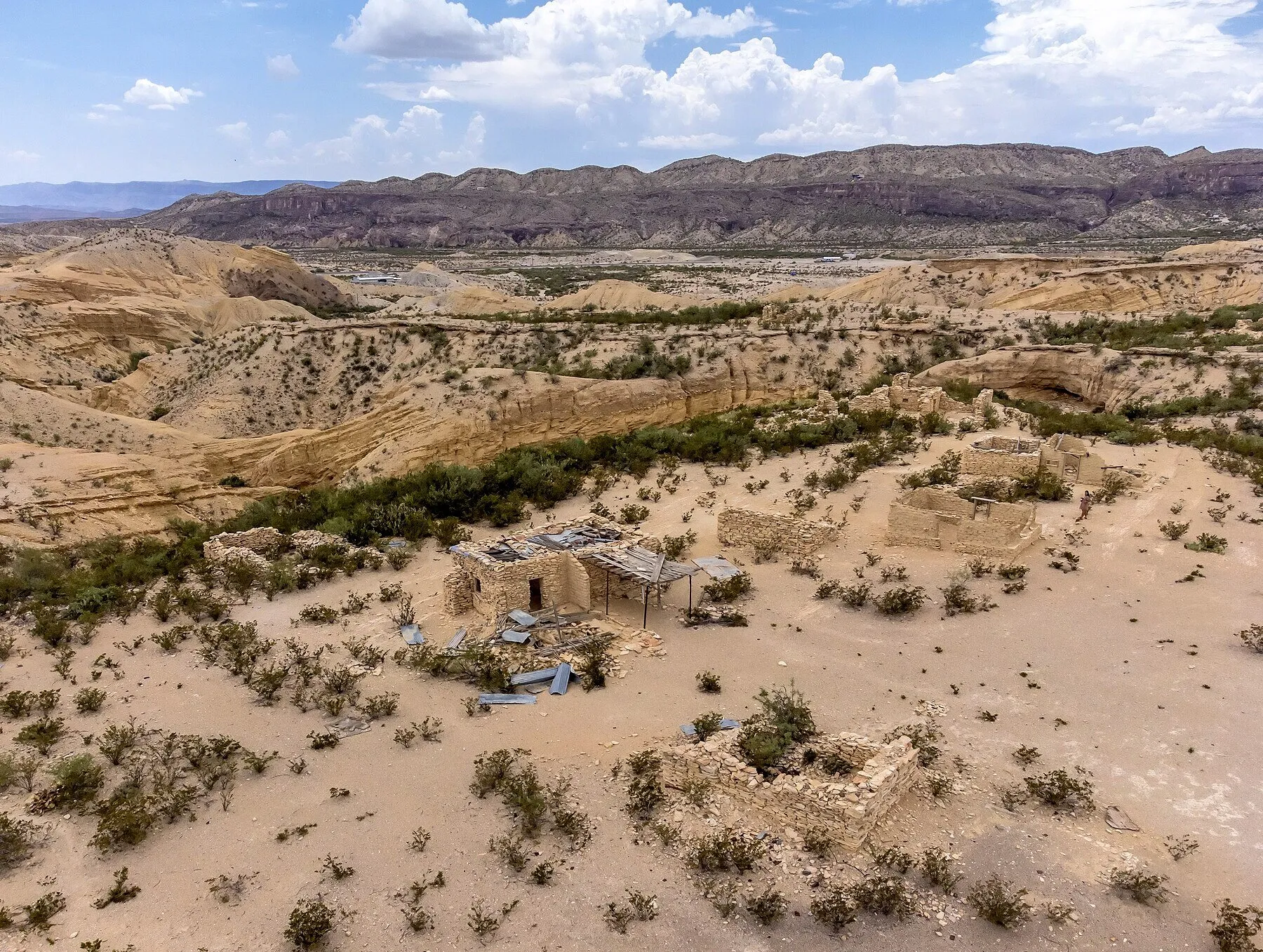 Stone ruins and desert mountains at Terlingua Ghost Town