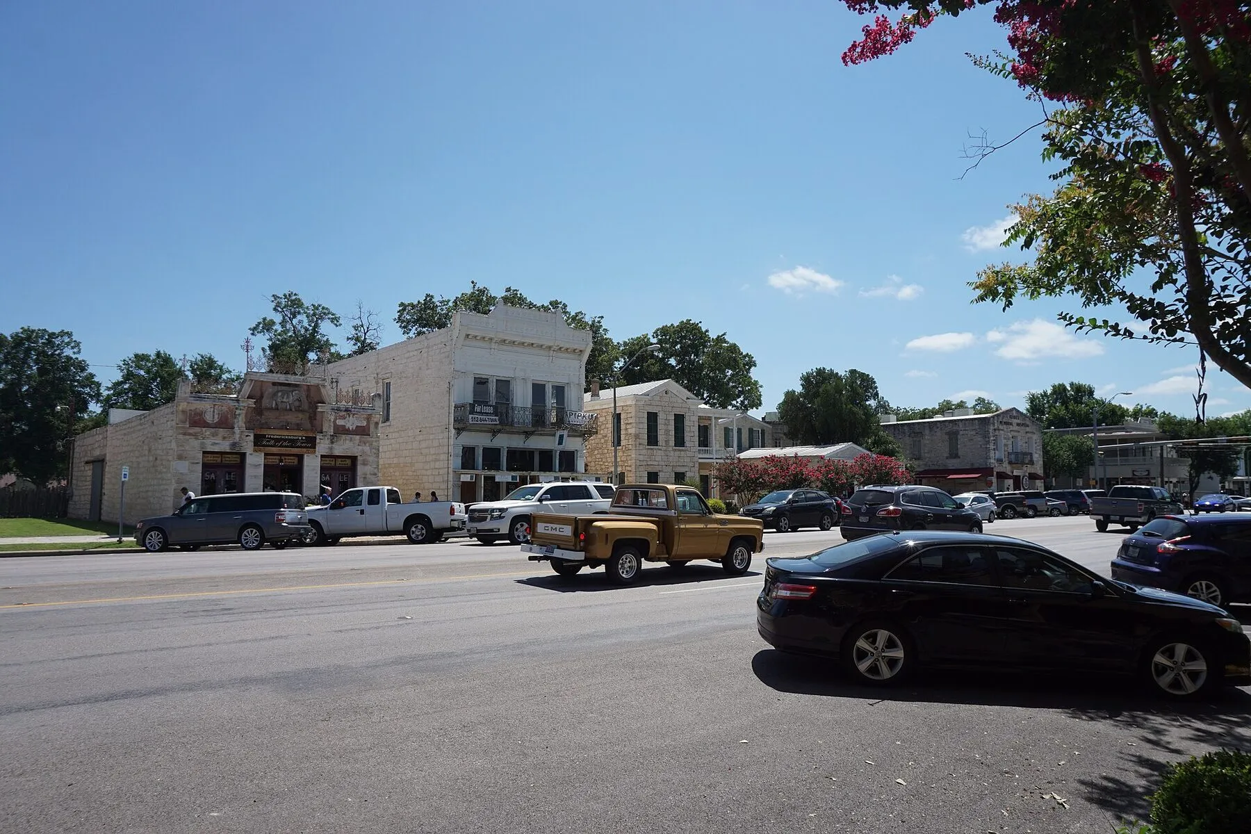 Historic stone buildings and storefronts along East Main Street in Fredericksburg