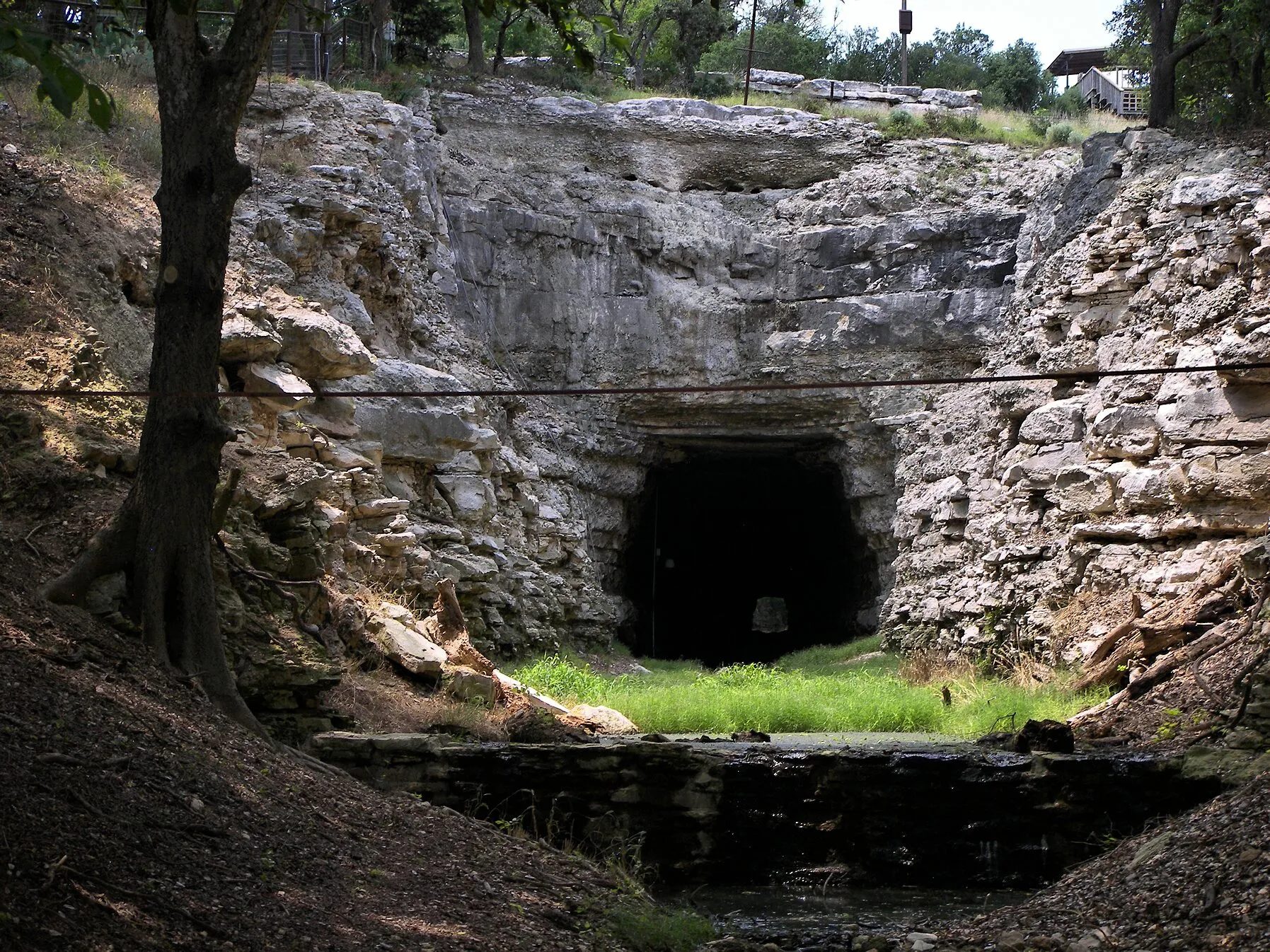 Stone entrance of the former railroad tunnel at Old Tunnel State Park
