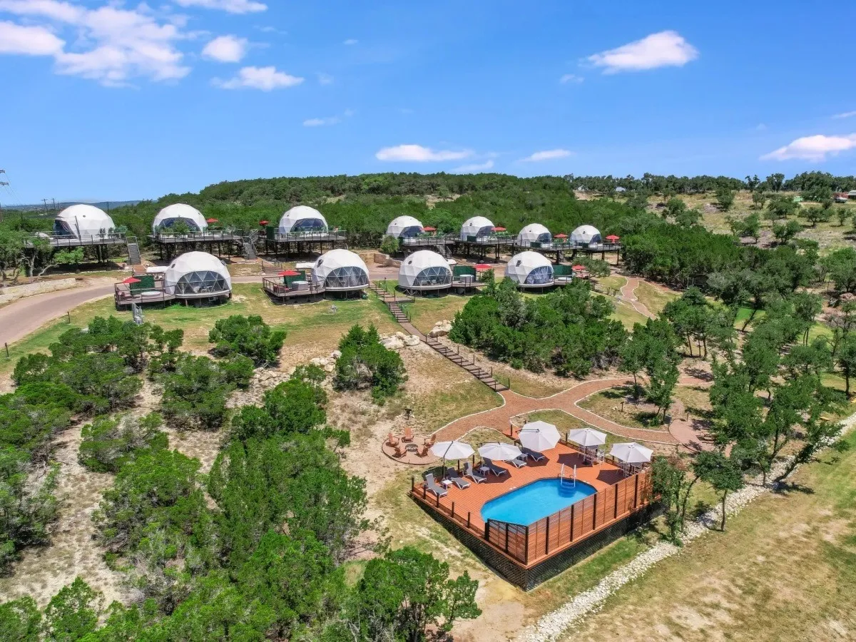 Aerial view of Udoscape's pods and shared swimming pool