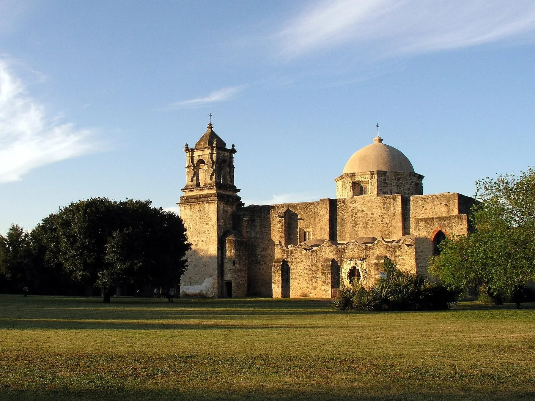 Stone facade and bell tower at a Spanish colonial mission in San Antonio Missions National Historical Park